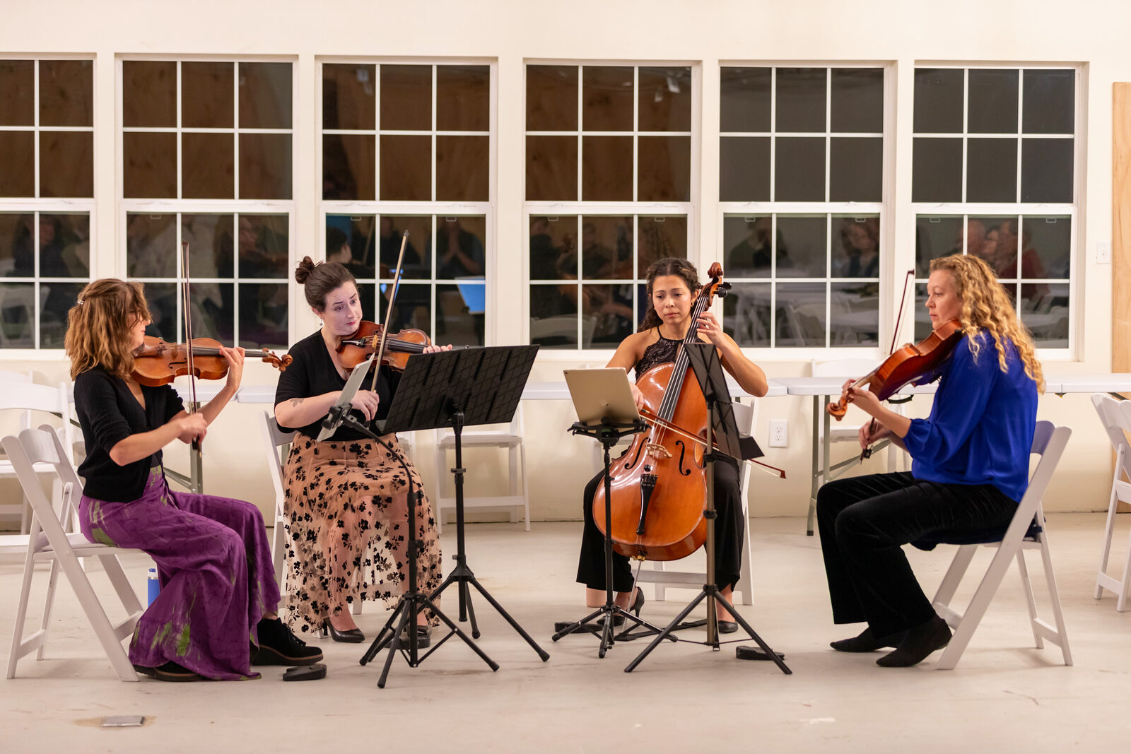 A string quartet performing a Let Music Speak concert