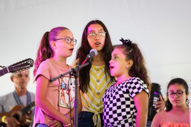 Vocalists performing together at PaoliFest